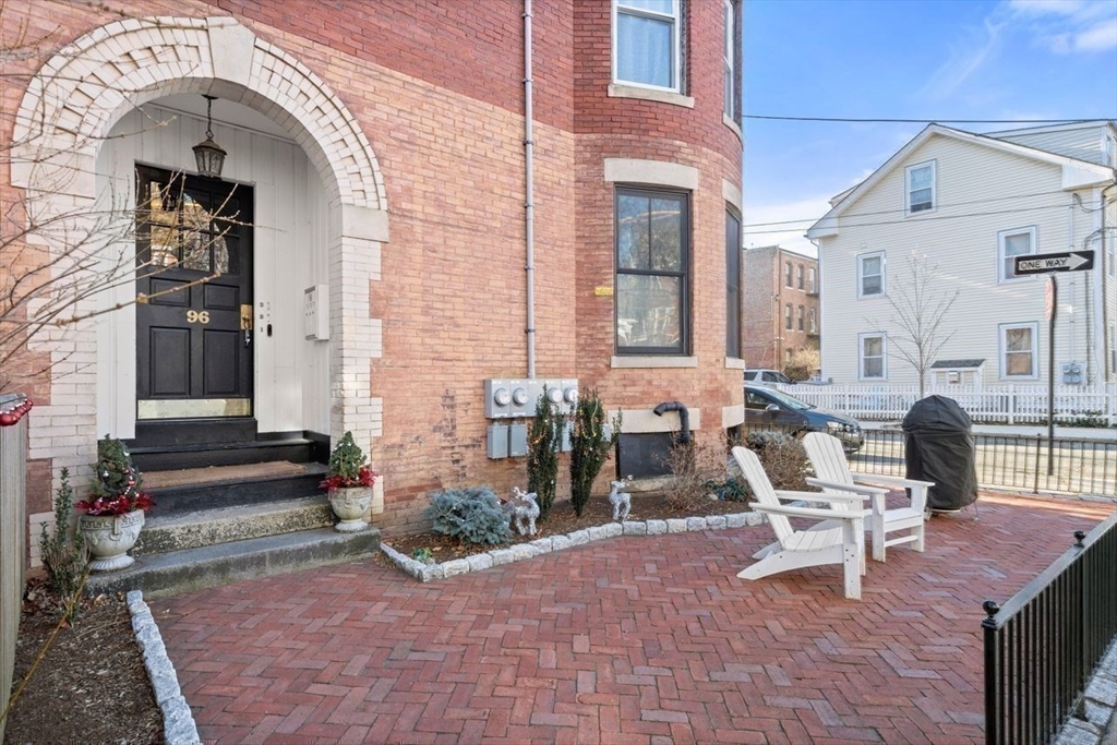 96 Brook Street, Unit 3 Brookline, MA 02445 - Photo 28 of 32 a front view of a house with outdoor seating