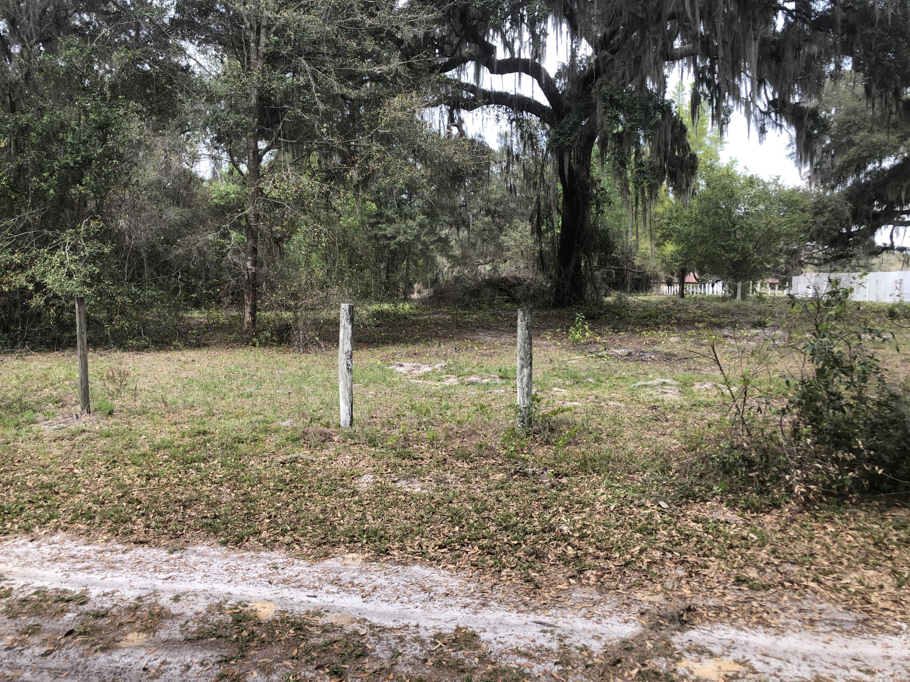 0 Unassigned Location Re Palatka, FL 32177 - Photo 3 of 3 a backyard of a house with lots of green space
