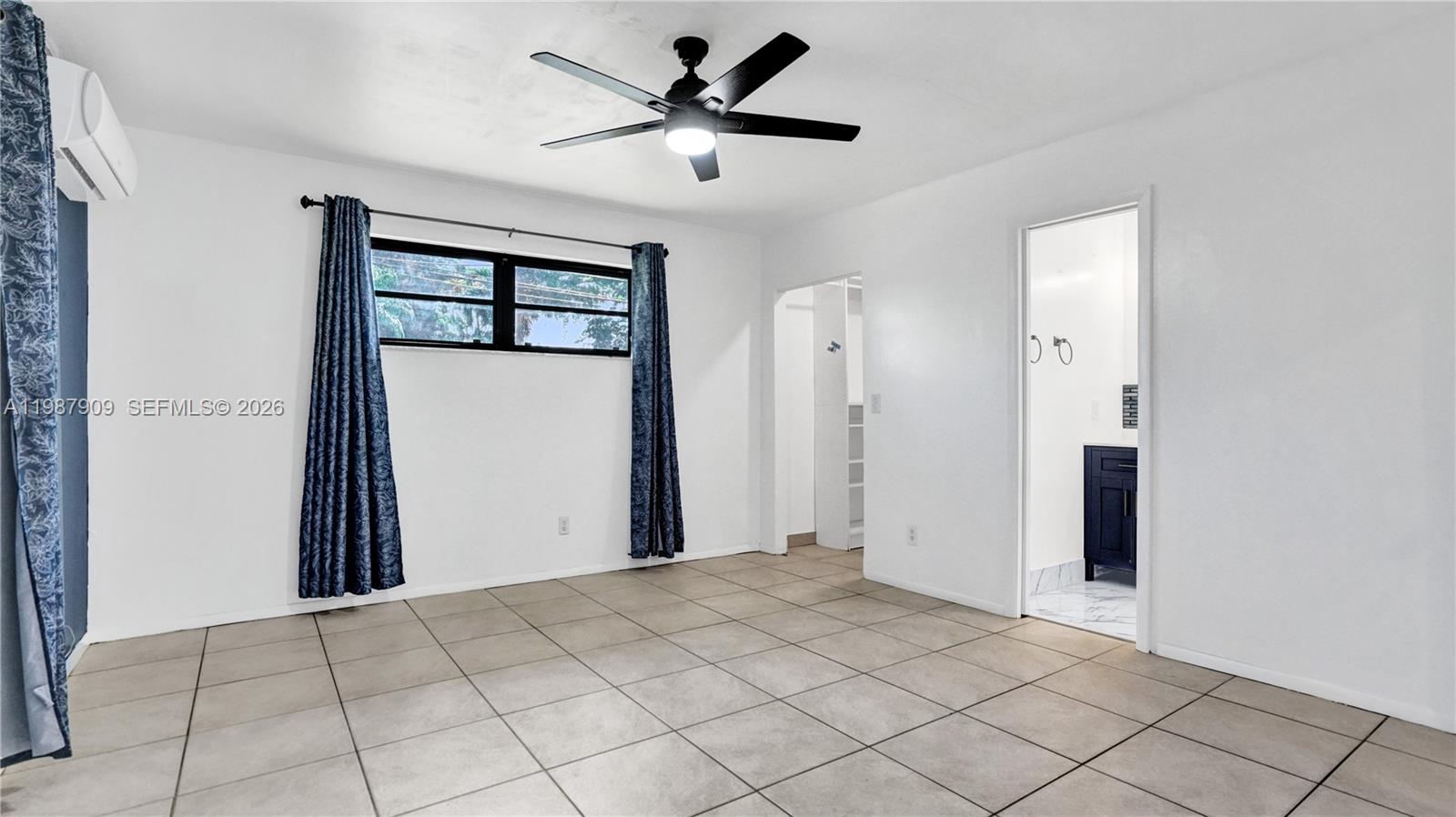 1007 North 31st Road Hollywood, FL 33021 - Photo 24 of 54 a view of a livingroom with a ceiling fan and window
