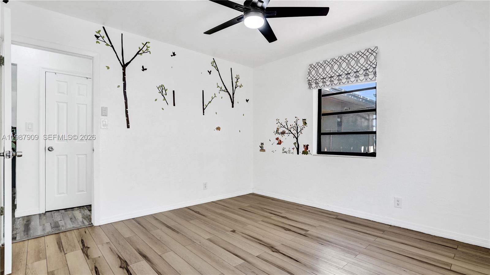 1007 North 31st Road Hollywood, FL 33021 - Photo 30 of 54 a view of a hallway with wooden floor and entryway