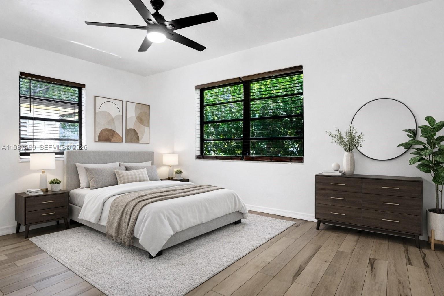 1007 North 31st Road Hollywood, FL 33021 - Photo 3 of 54 a bedroom with a bed and a dresser