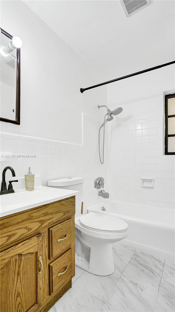 1007 North 31st Road Hollywood, FL 33021 - Photo 34 of 54 a bathroom with a sink toilet and shower