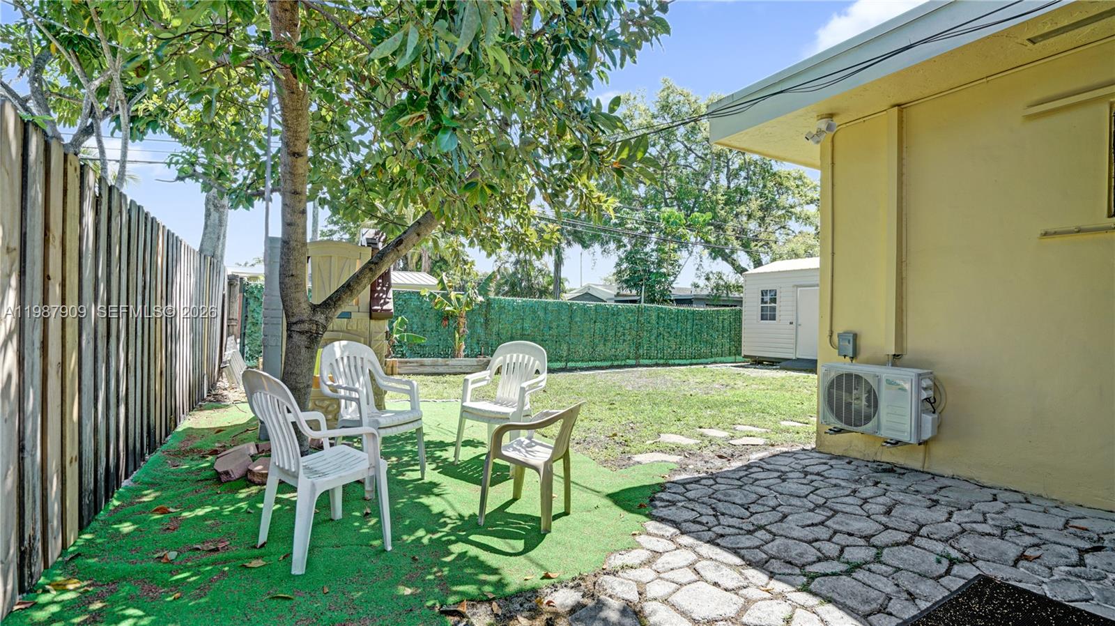 1007 North 31st Road Hollywood, FL 33021 - Photo 43 of 54 a view of chair and table in backyard