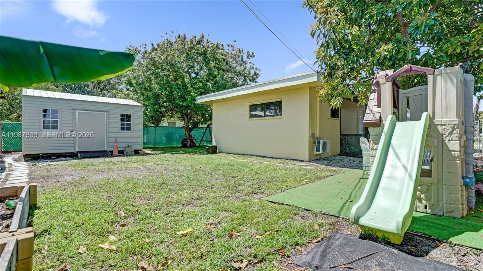 1007 North 31st Road Hollywood, FL 33021 - Photo 45 of 54 a view of a backyard with a house