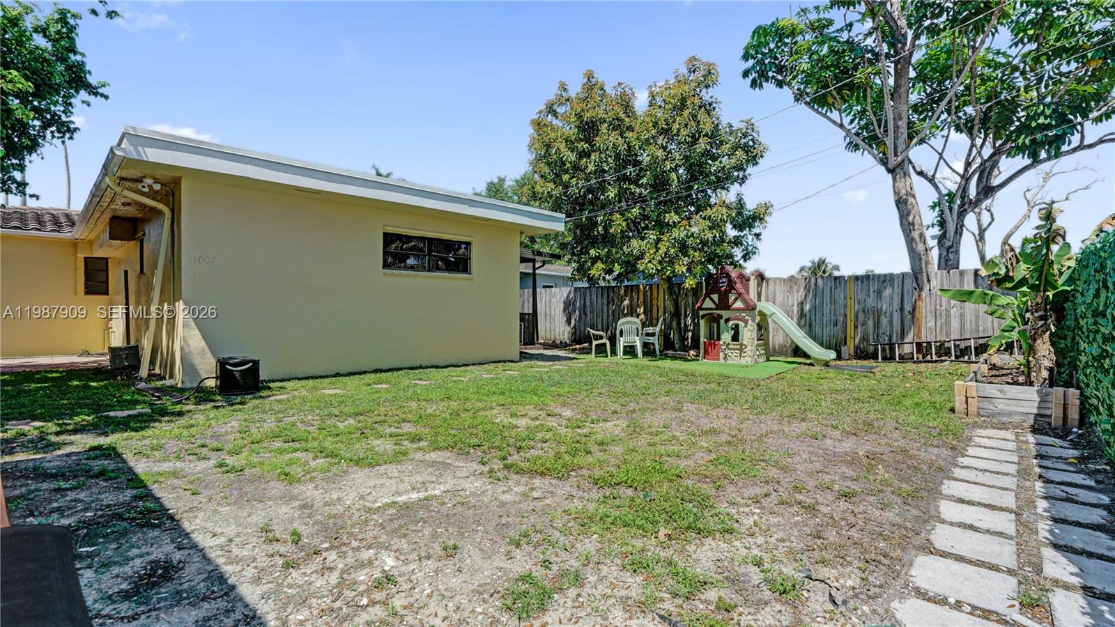 1007 North 31st Road Hollywood, FL 33021 - Photo 47 of 54 a view of a backyard with a tree
