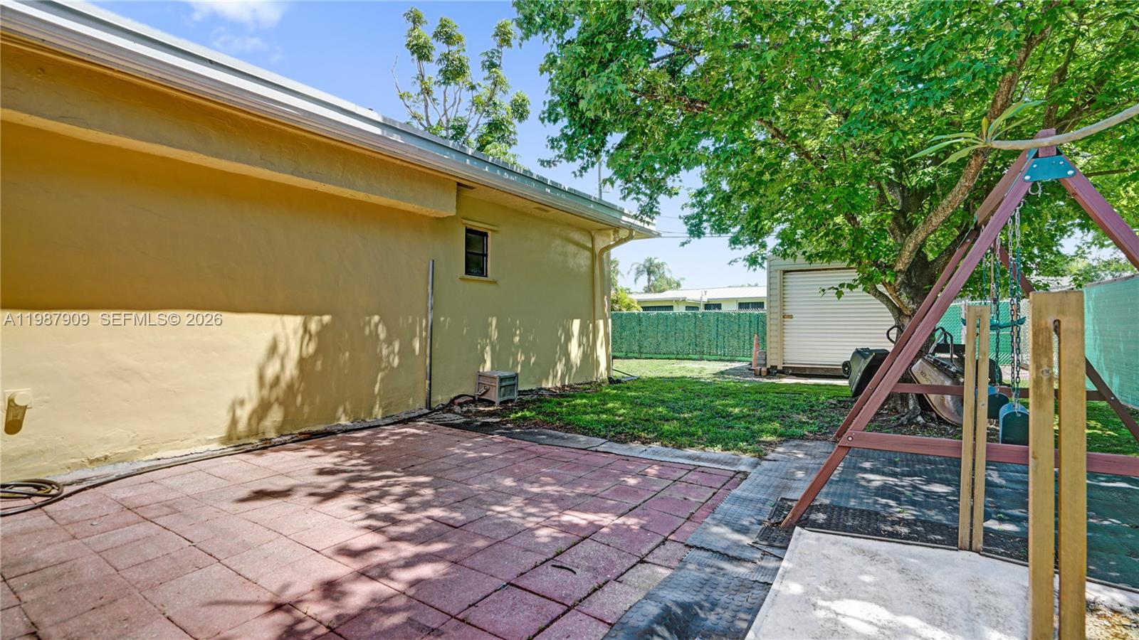 1007 North 31st Road Hollywood, FL 33021 - Photo 51 of 54 a front view of a house with a yard