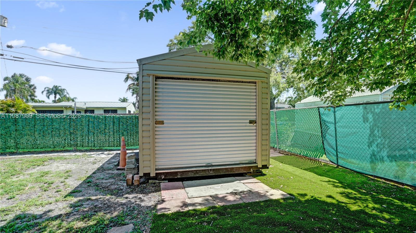 1007 North 31st Road Hollywood, FL 33021 - Photo 52 of 54 a view of a backyard with a garden