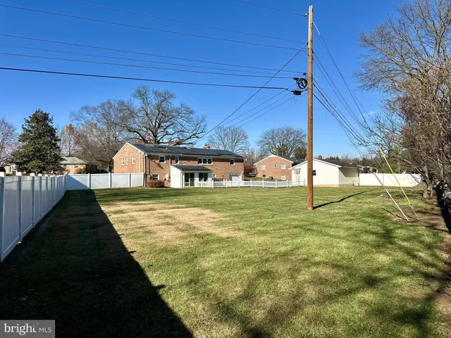 a kitchen with a sink cabinets and window