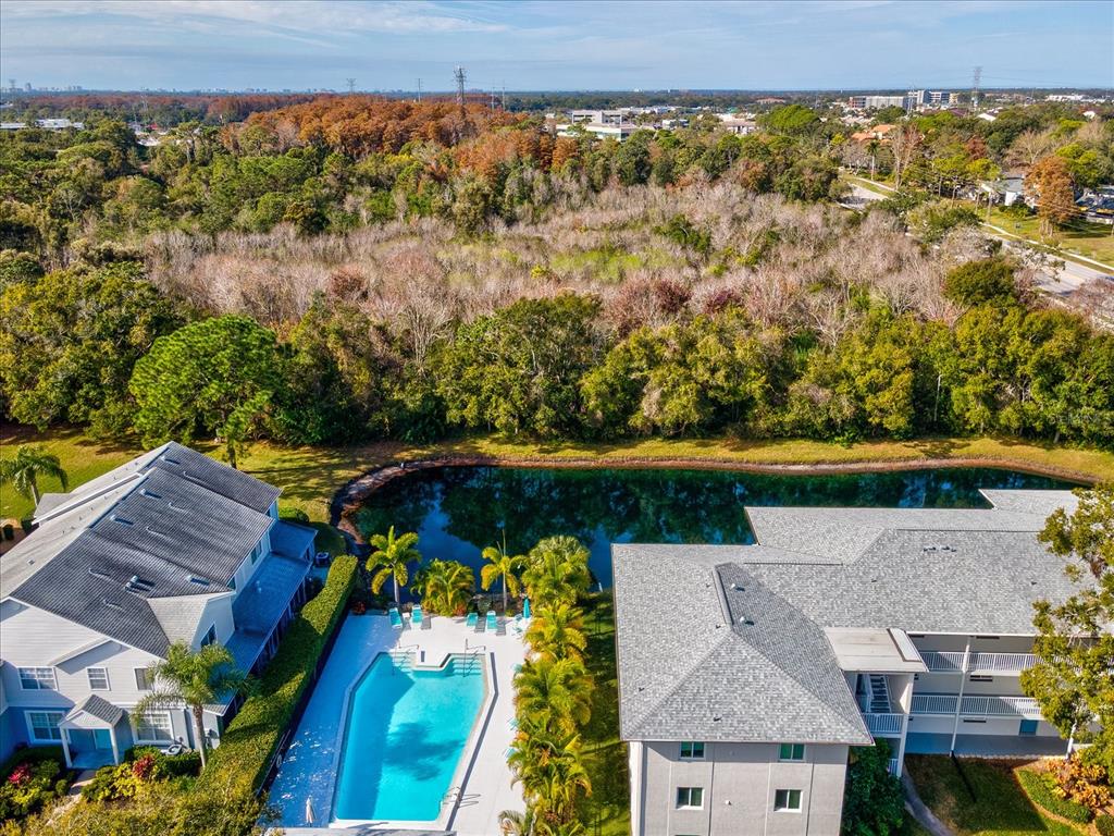 2737 Enterprise Road East, Unit 111 Clearwater, FL 33759 - Photo 27 of 28 an aerial view of a house with a yard