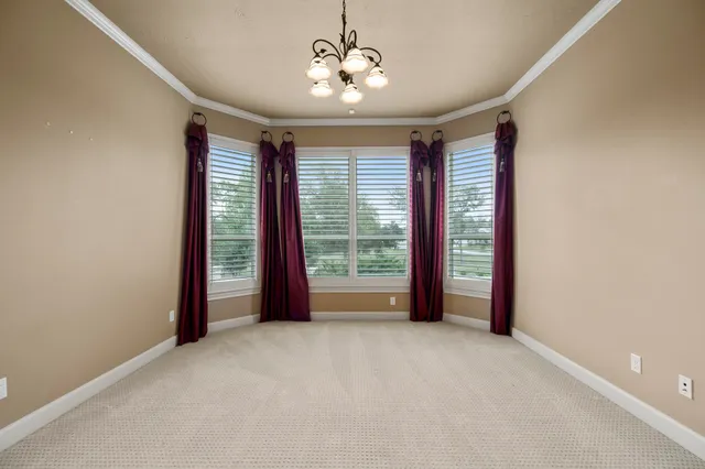 a view of a room with windows