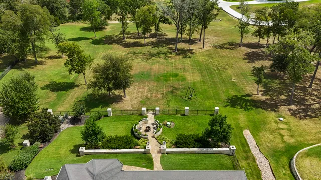 a view of a lake with a yard