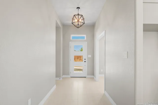 a view of an entryway and a window