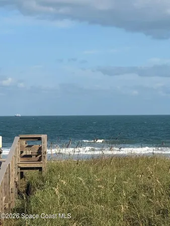 a view of a lake with a big yard