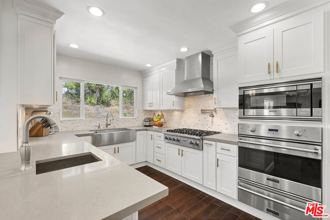 1823 Fern Lane Glendale, CA 91208 - Photo 13 of 30 a kitchen with a sink stove and microwave