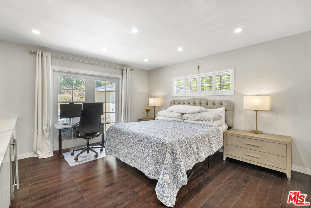 1823 Fern Lane Glendale, CA 91208 - Photo 20 of 30 a bedroom with a bed chair and a window