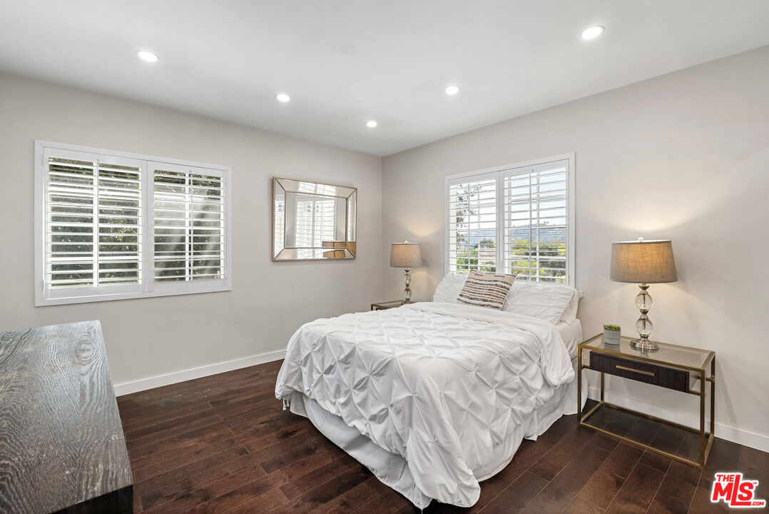 1823 Fern Lane Glendale, CA 91208 - Photo 25 of 30 a bedroom with a bed and a night stand