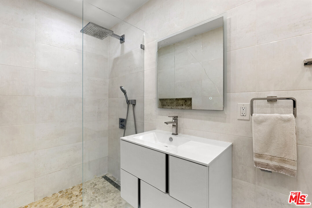 1823 Fern Lane Glendale, CA 91208 - Photo 26 of 30 a bathroom with a sink toilet and shower