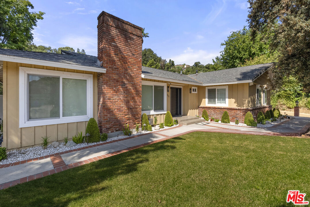1823 Fern Lane Glendale, CA 91208 - Photo 3 of 30 a front view of house with yard and outdoor seating