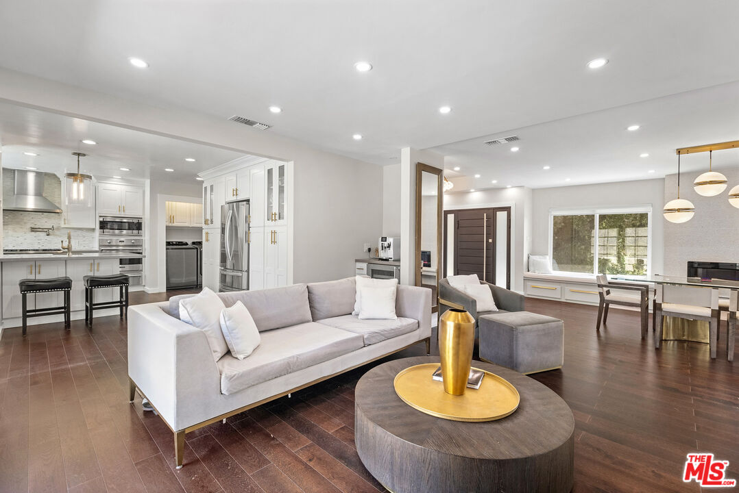 1823 Fern Lane Glendale, CA 91208 - Photo 10 of 30 a living room with furniture and a dining table with kitchen view