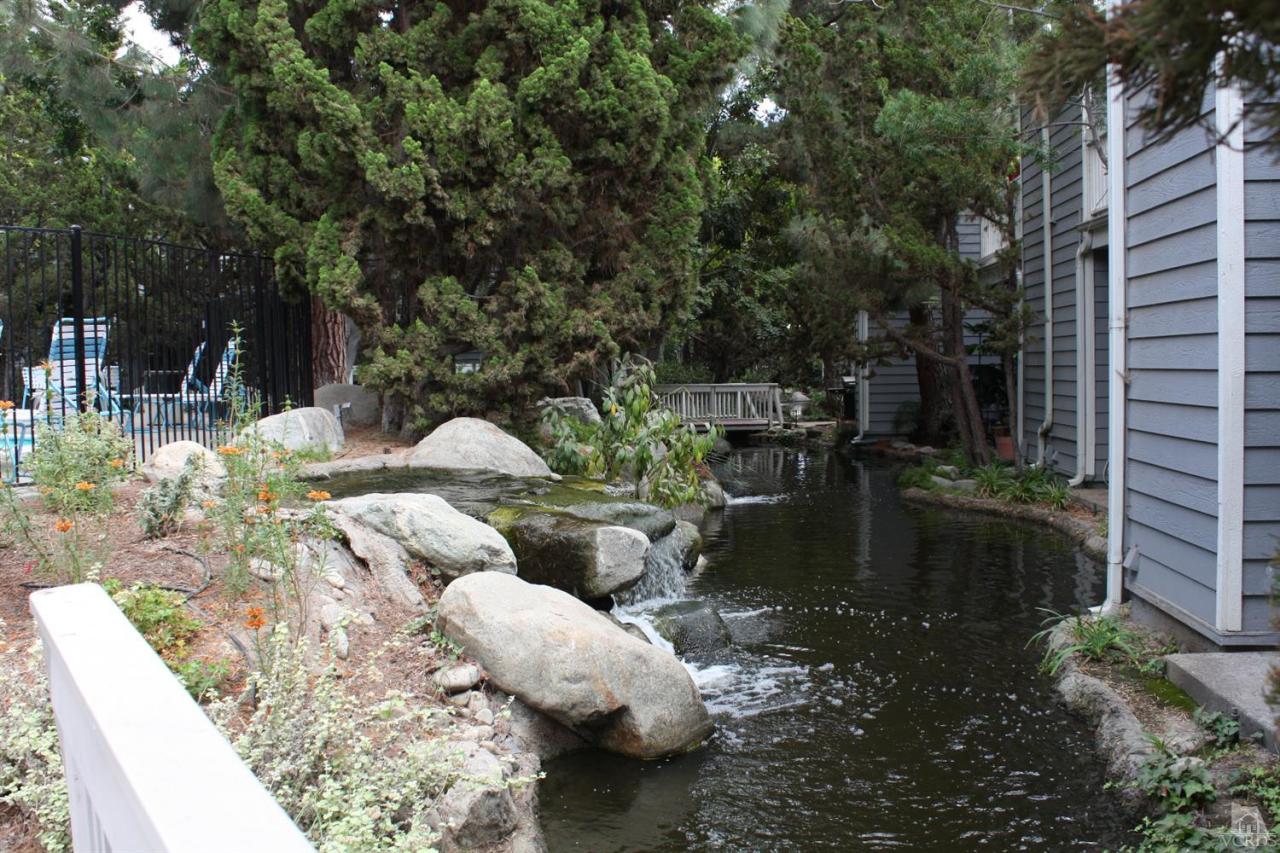 661 Arneill Road Camarillo, CA 93010 - Photo 13 of 22 a backyard of a house with yard fire pit and outdoor seating