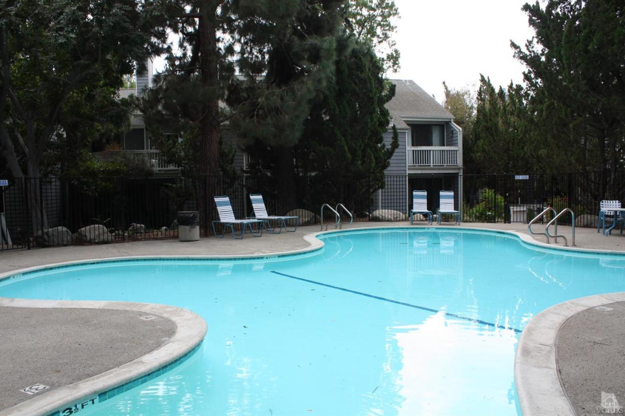 661 Arneill Road Camarillo, CA 93010 - Photo 20 of 22 a view of a swimming pool with a patio