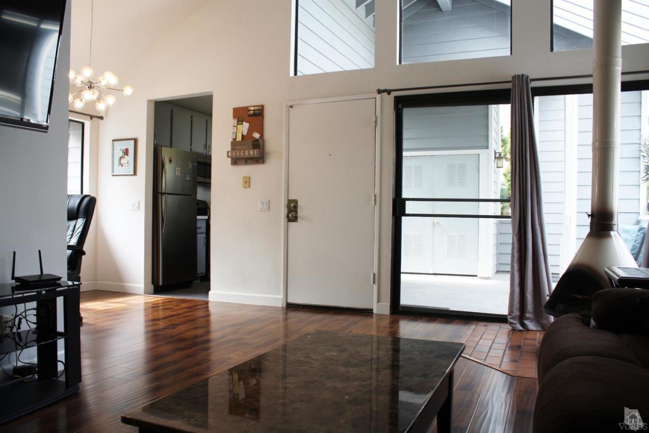 661 Arneill Road Camarillo, CA 93010 - Photo 3 of 22 a view of a livingroom with furniture and hardwood floor