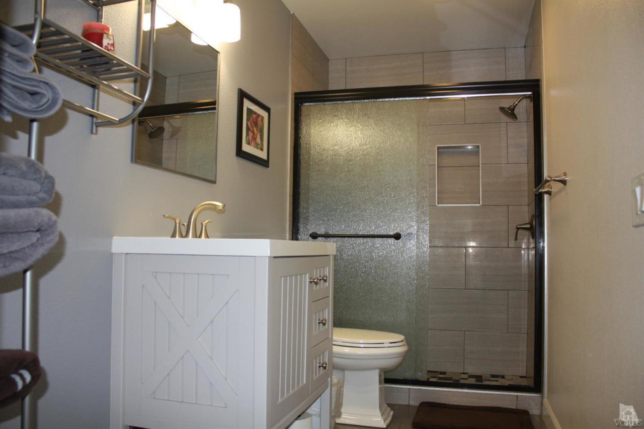 661 Arneill Road Camarillo, CA 93010 - Photo 4 of 22 a bathroom with a toilet sink and shower