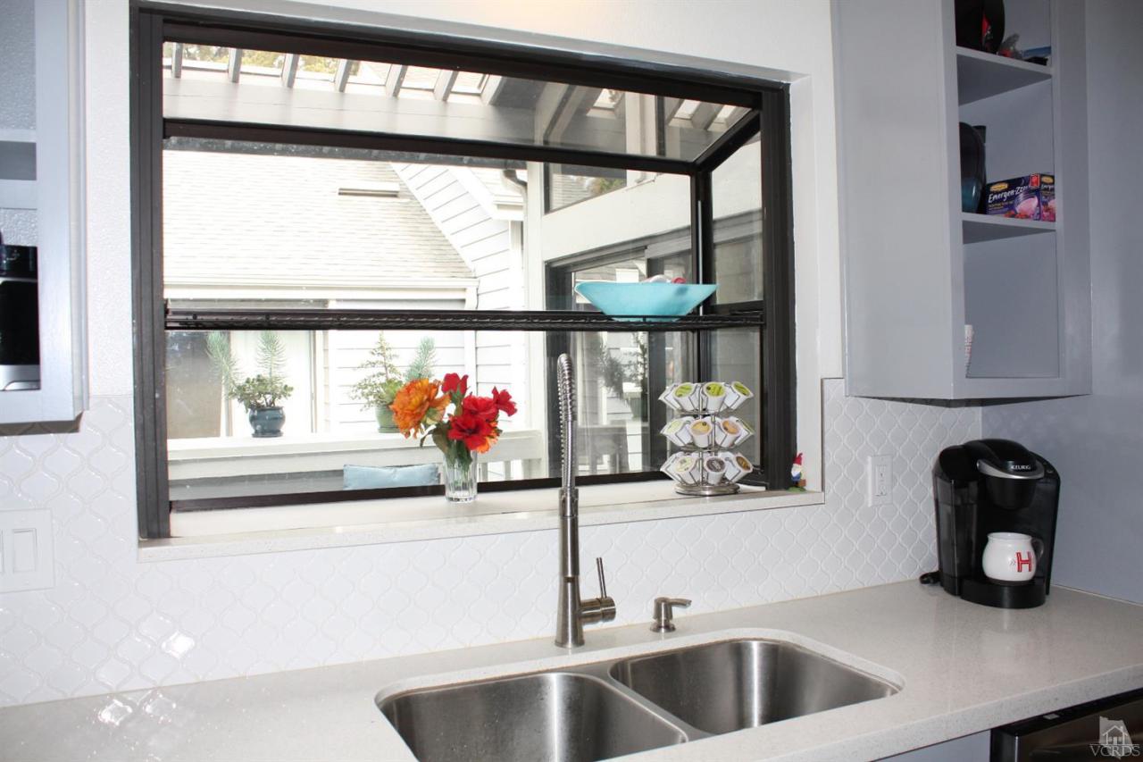 661 Arneill Road Camarillo, CA 93010 - Photo 8 of 22 a kitchen with a sink and a window