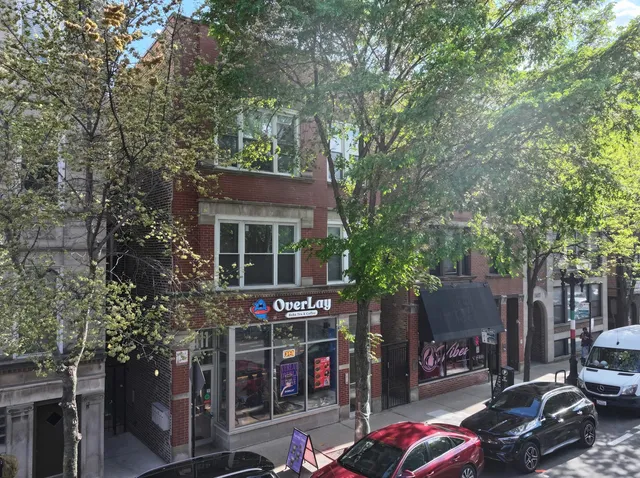 a kitchen with stainless steel appliances a refrigerator sink and microwave