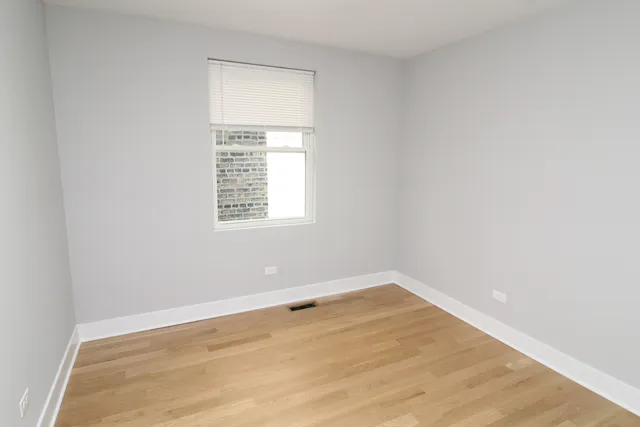 a view of small space with wooden floor