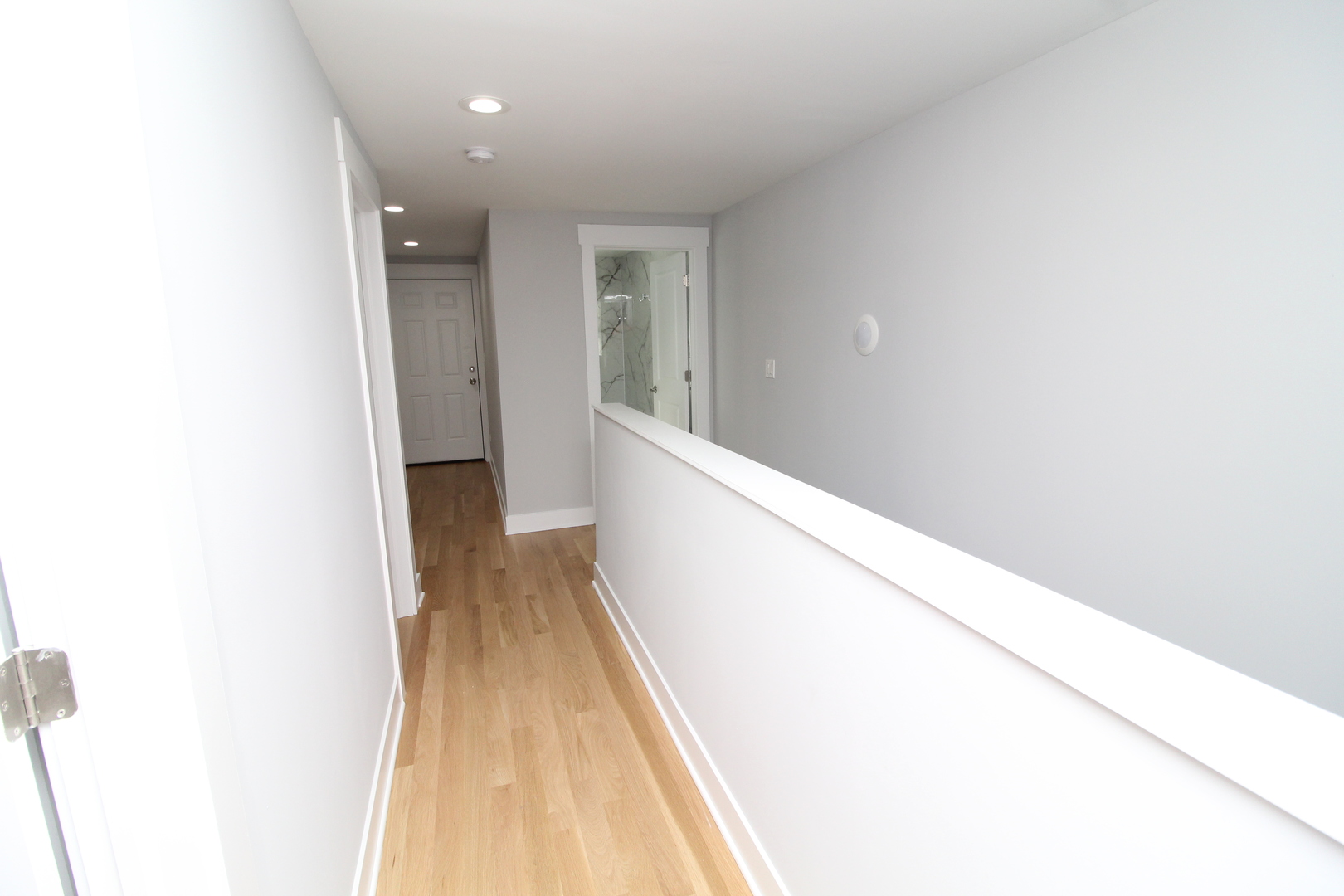 1411 West Taylor Street Chicago, IL 60607 - Photo 14 of 18 a view of a hallway with wooden floor
