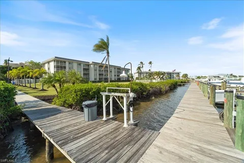 a view of a lake with sitting area