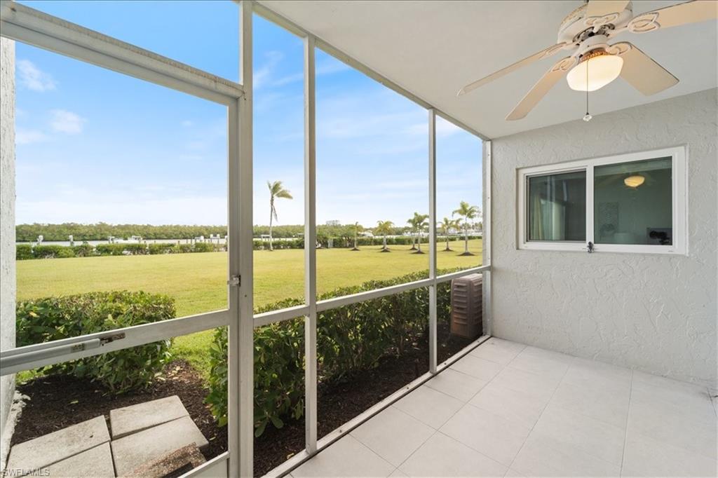 307 Goodlette-Frank Road, Unit B202 Naples, FL 34102 - Photo 24 of 32 a view of a city from a balcony