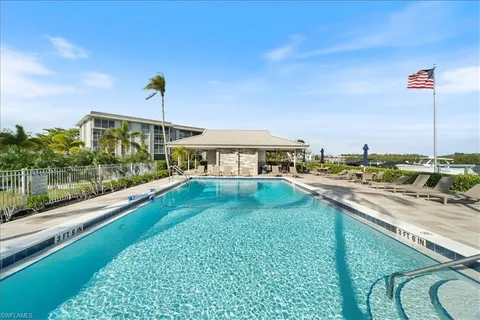 a view of swimming pool from a balcony