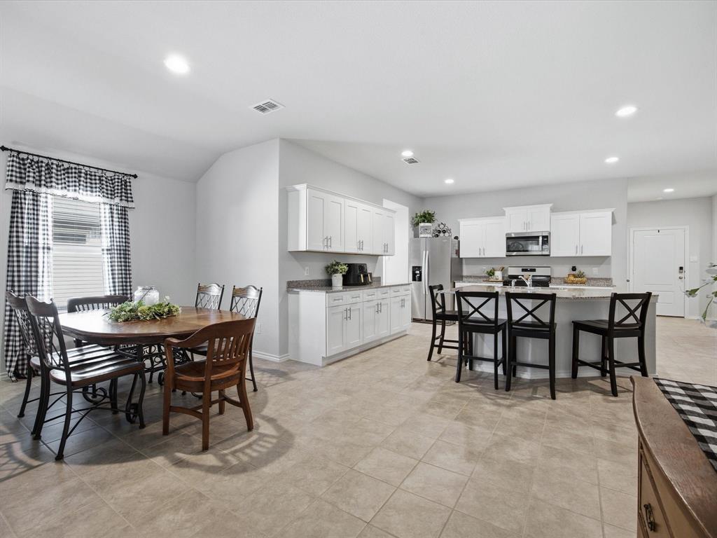 521 Bronze Circle East Springtown, TX 76082 - Photo 8 of 22 a view of a dining room with furniture