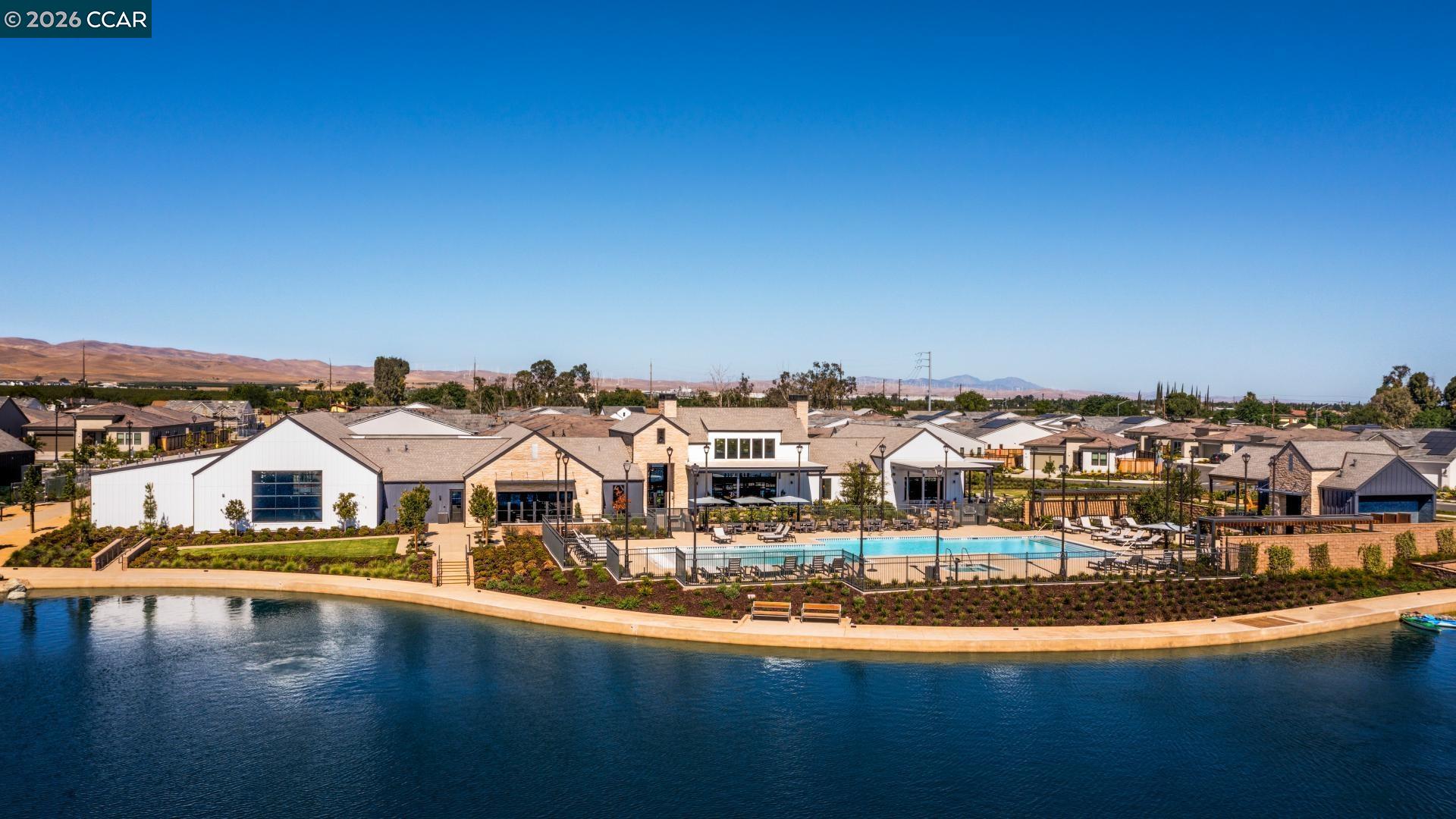 1885 Cascade Lane Tracy, CA 95377 - Photo 40 of 40 a view of houses with city skyline and lake view