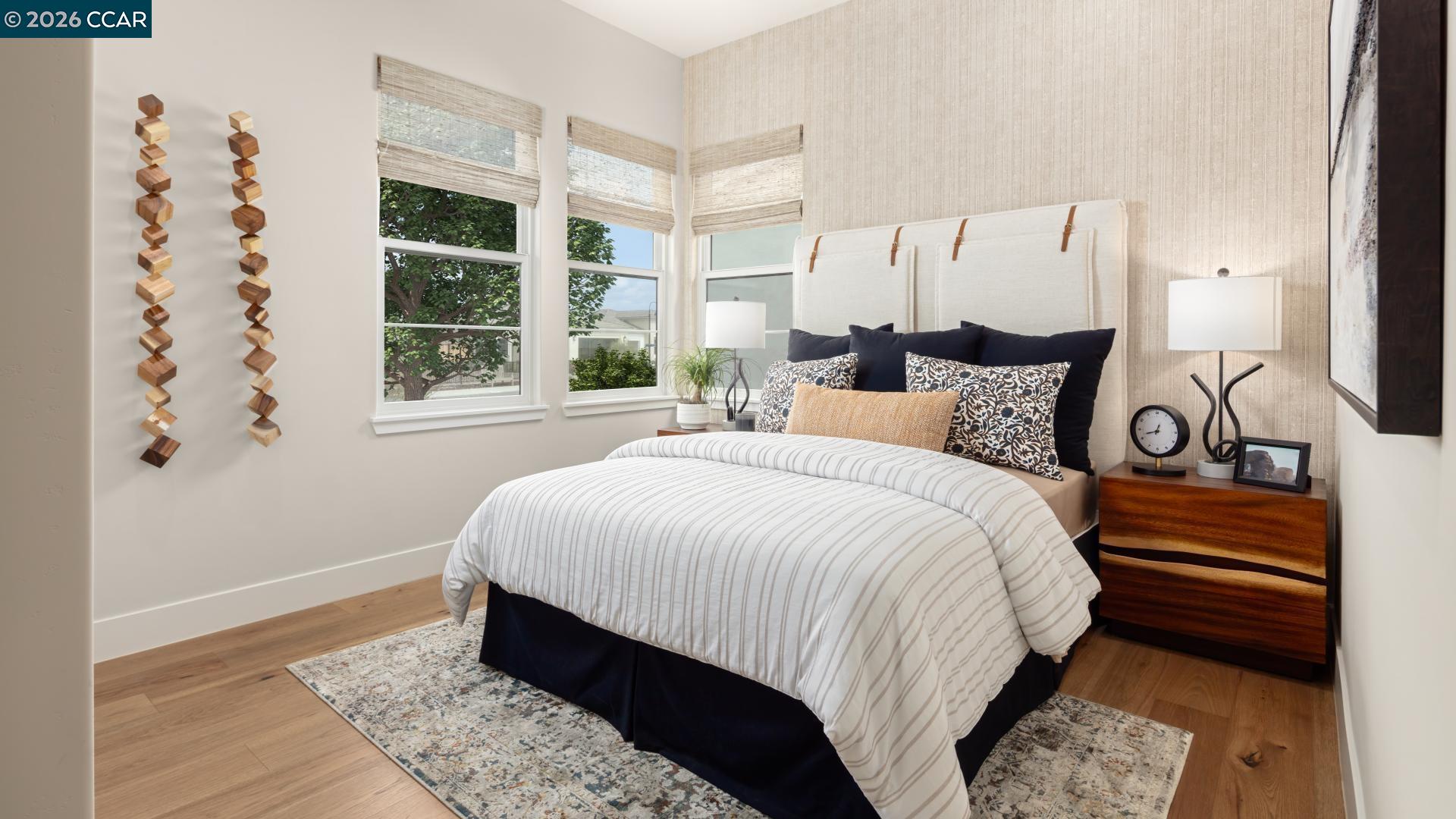 1885 Cascade Lane Tracy, CA 95377 - Photo 8 of 40 a bedroom with a large bed and a window