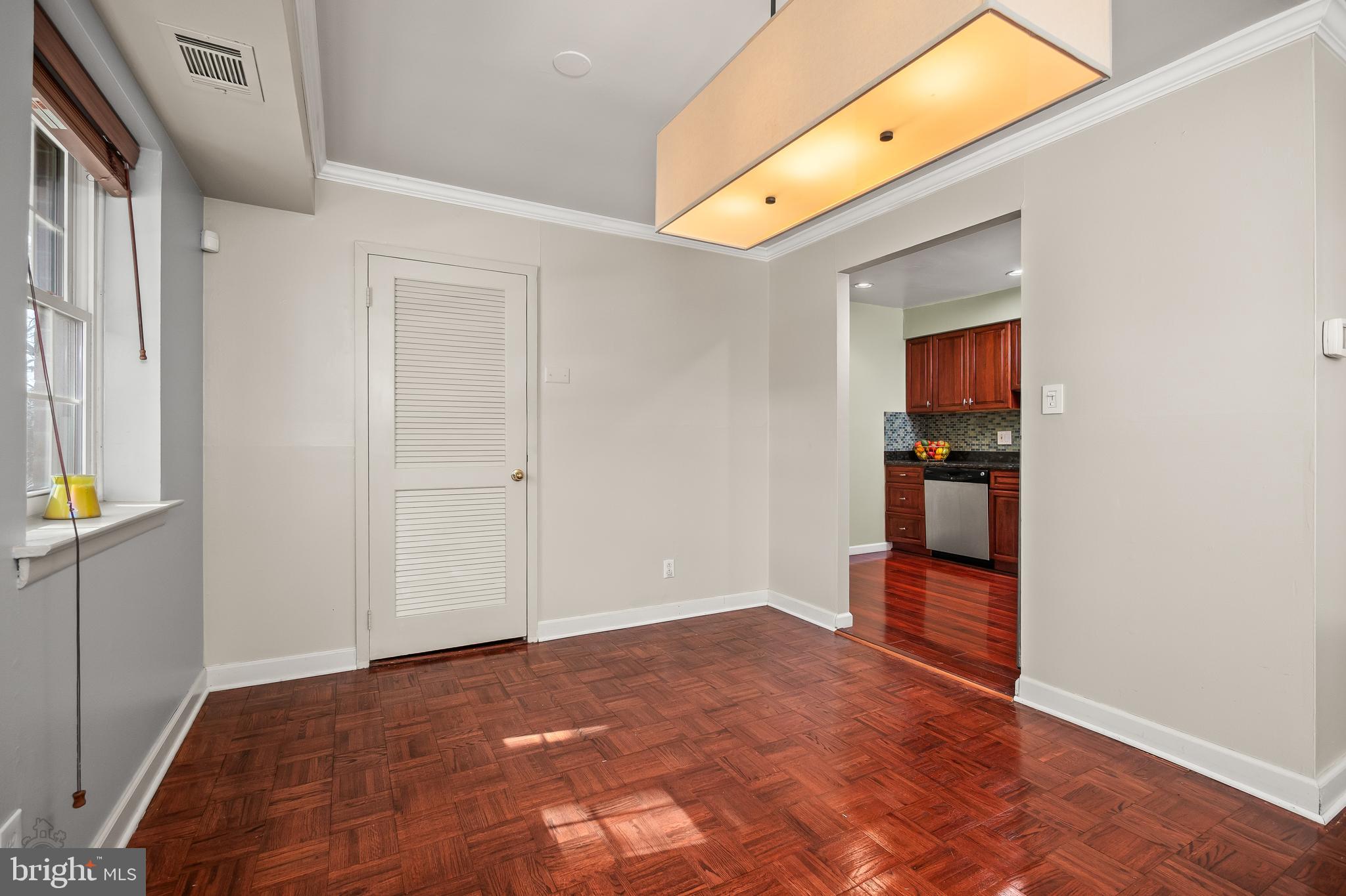 4000 Gypsy Lane, Unit 210 Philadelphia, PA 19129 - Photo 15 of 35 an empty room with kitchen view