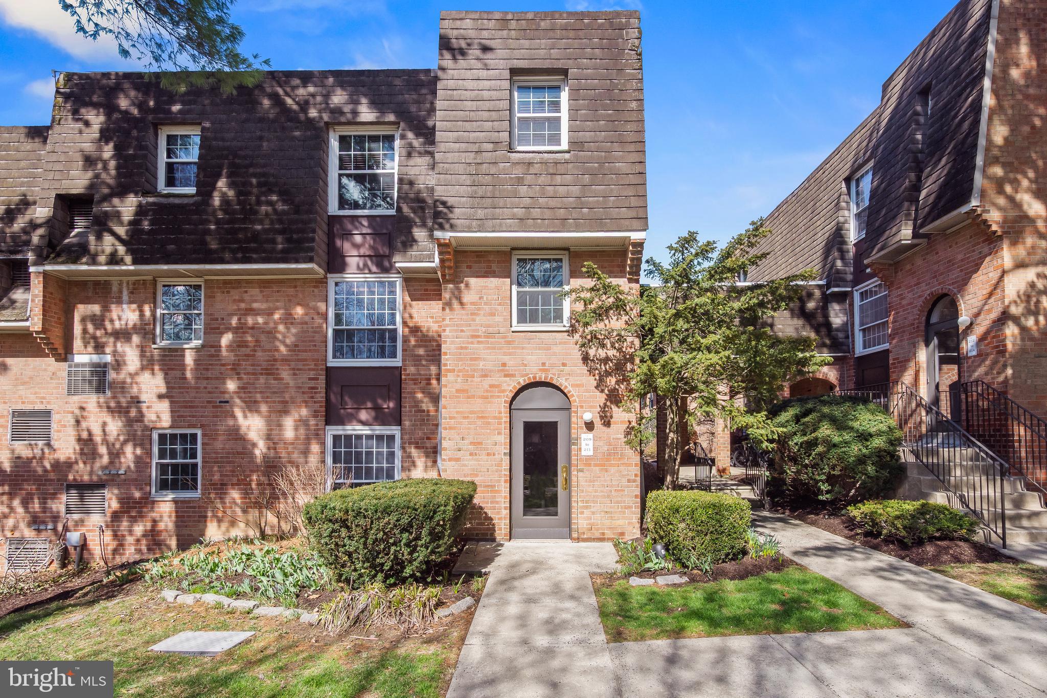 4000 Gypsy Lane, Unit 210 Philadelphia, PA 19129 - Photo 2 of 35 a front view of a house