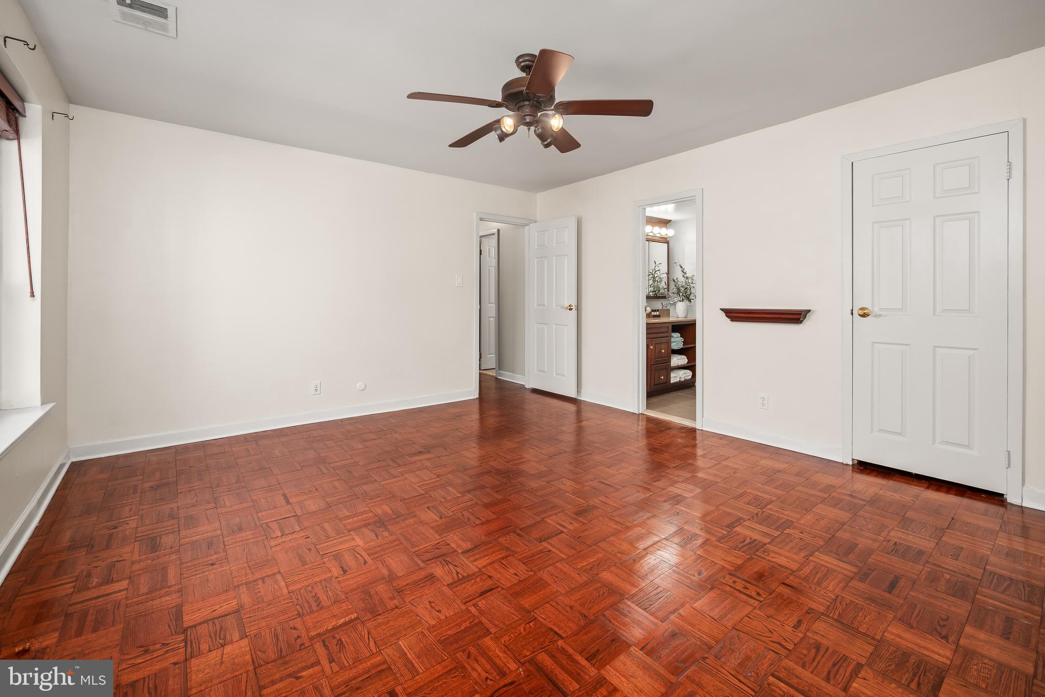4000 Gypsy Lane, Unit 210 Philadelphia, PA 19129 - Photo 22 of 35 a view of a livingroom with a ceiling fan and window