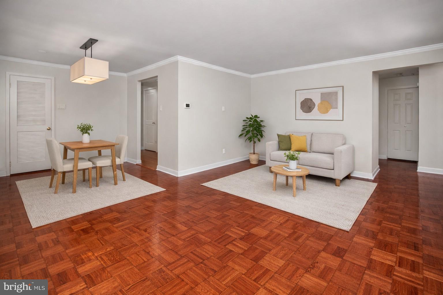 4000 Gypsy Lane, Unit 210 Philadelphia, PA 19129 - Photo 4 of 35 a living room with furniture and a wooden floor