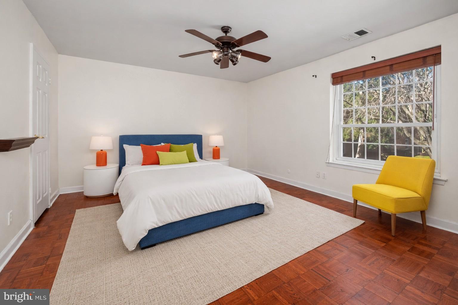 4000 Gypsy Lane, Unit 210 Philadelphia, PA 19129 - Photo 7 of 35 a bedroom with a bed and a couch