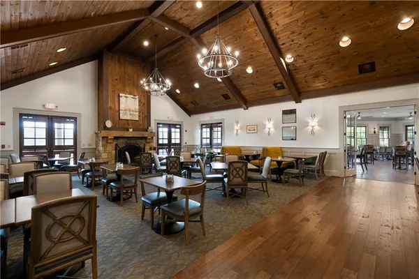 a view of a livingroom with furniture and a fireplace