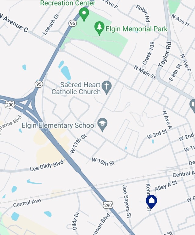 510 West Brenham Street Elgin, TX 78621 - Photo 4 of 17 a picture of a book and a white bed