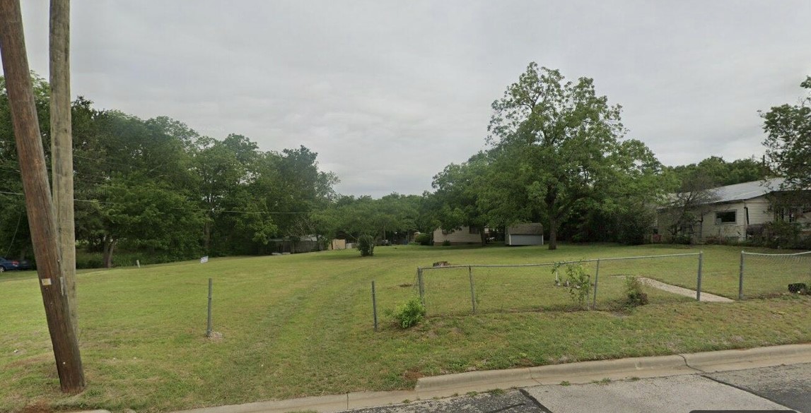 510 West Brenham Street Elgin, TX 78621 - Photo 9 of 17 a view of a golf course with a trees