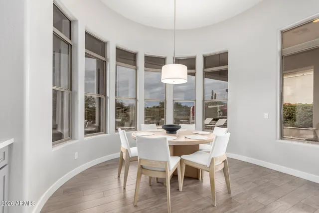 a bathroom with a double vanity sink toilet and shower