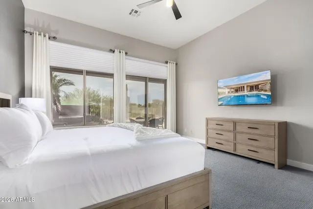 a view of a dining room with furniture window and outside view