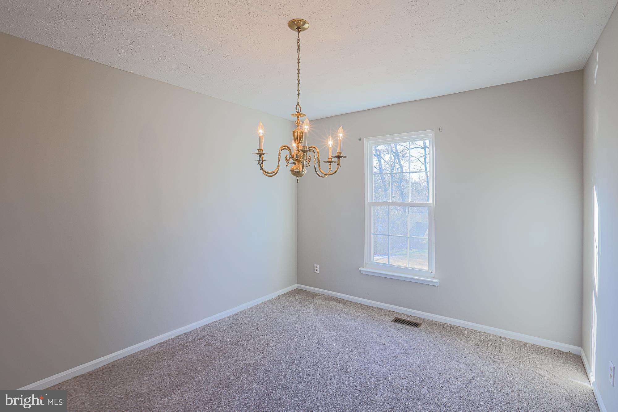 3607 Parkhurst Way Baltimore, MD 21236 - Photo 29 of 63 a view of a room with window and ceiling fan