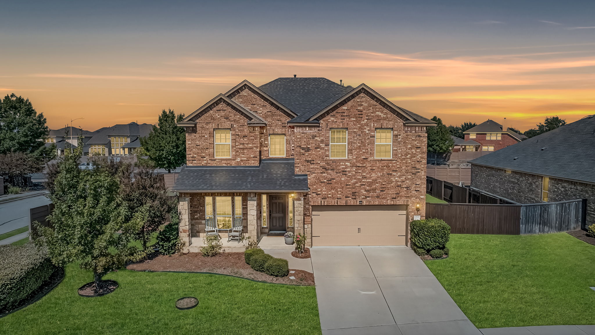 13300 Craven Lane Manor, TX 78653 - Photo 1 of 40 Evening view of this beautiful rare find--a ShadowGlen home on a 0.25-acre corner lot. Virtual Twilight.