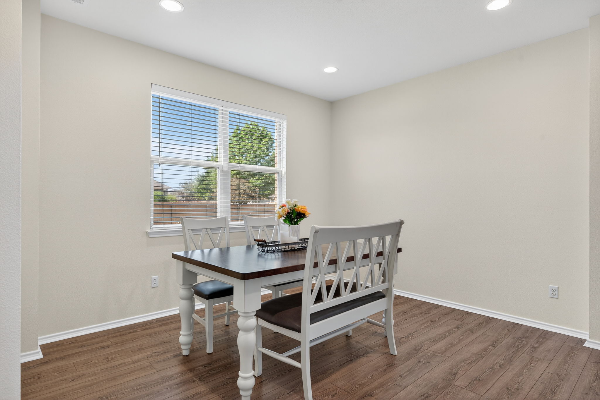 13300 Craven Lane Manor, TX 78653 - Photo 12 of 40 Dining room featuring luxury vinyl plank floors, natural light, and recessed lighting.